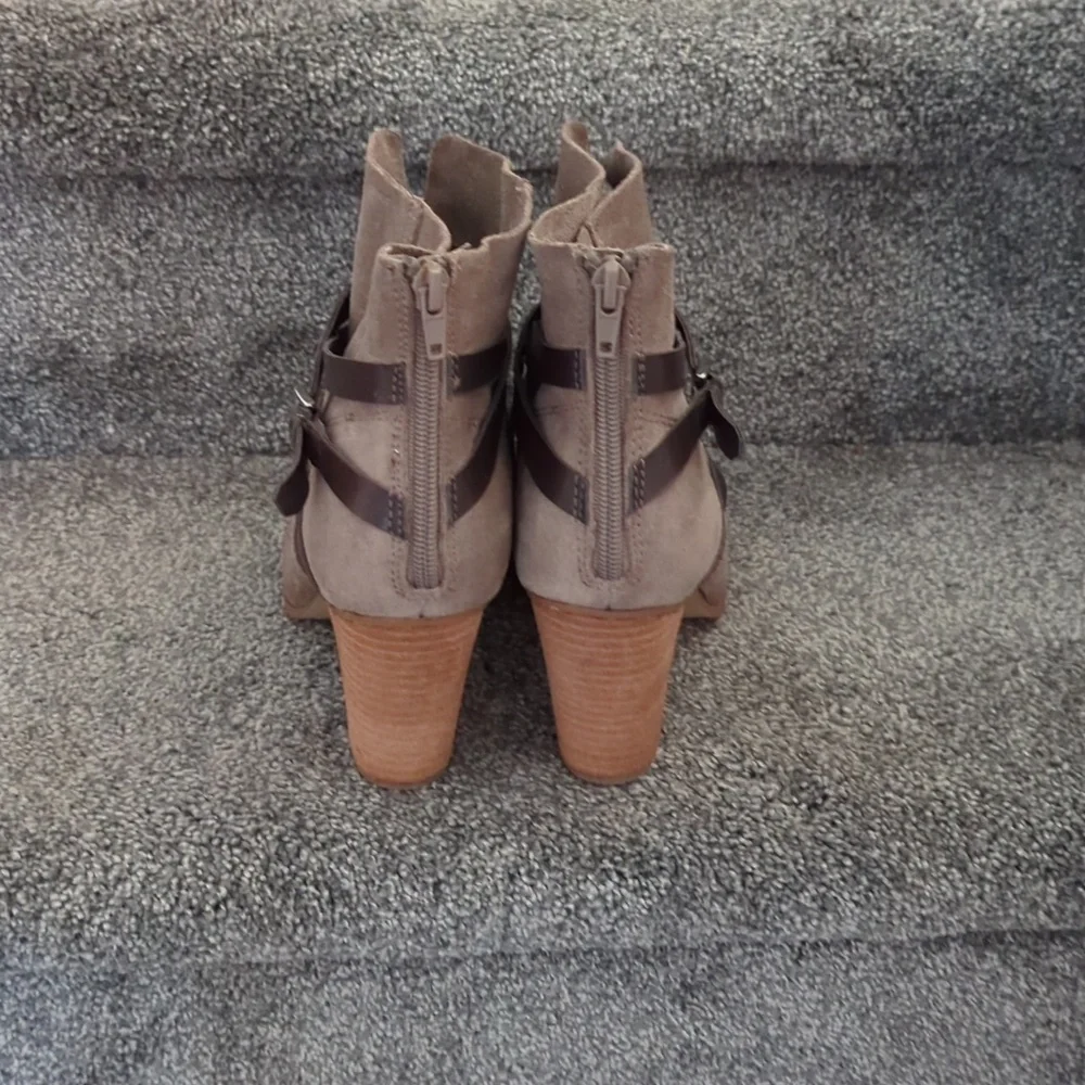 Ankle booties by Carlos Santana